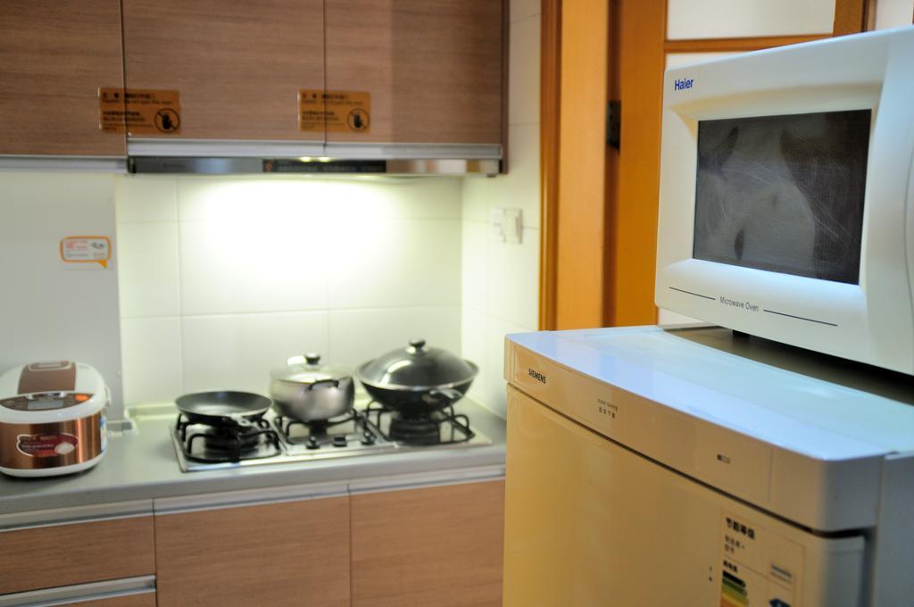 Shanghai Kingland Serviced Apartment Buitenkant foto